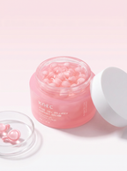 Crema en Cápsulas KOEC — ángulo 3/4 mostrando las cápsulas rosas de colágeno