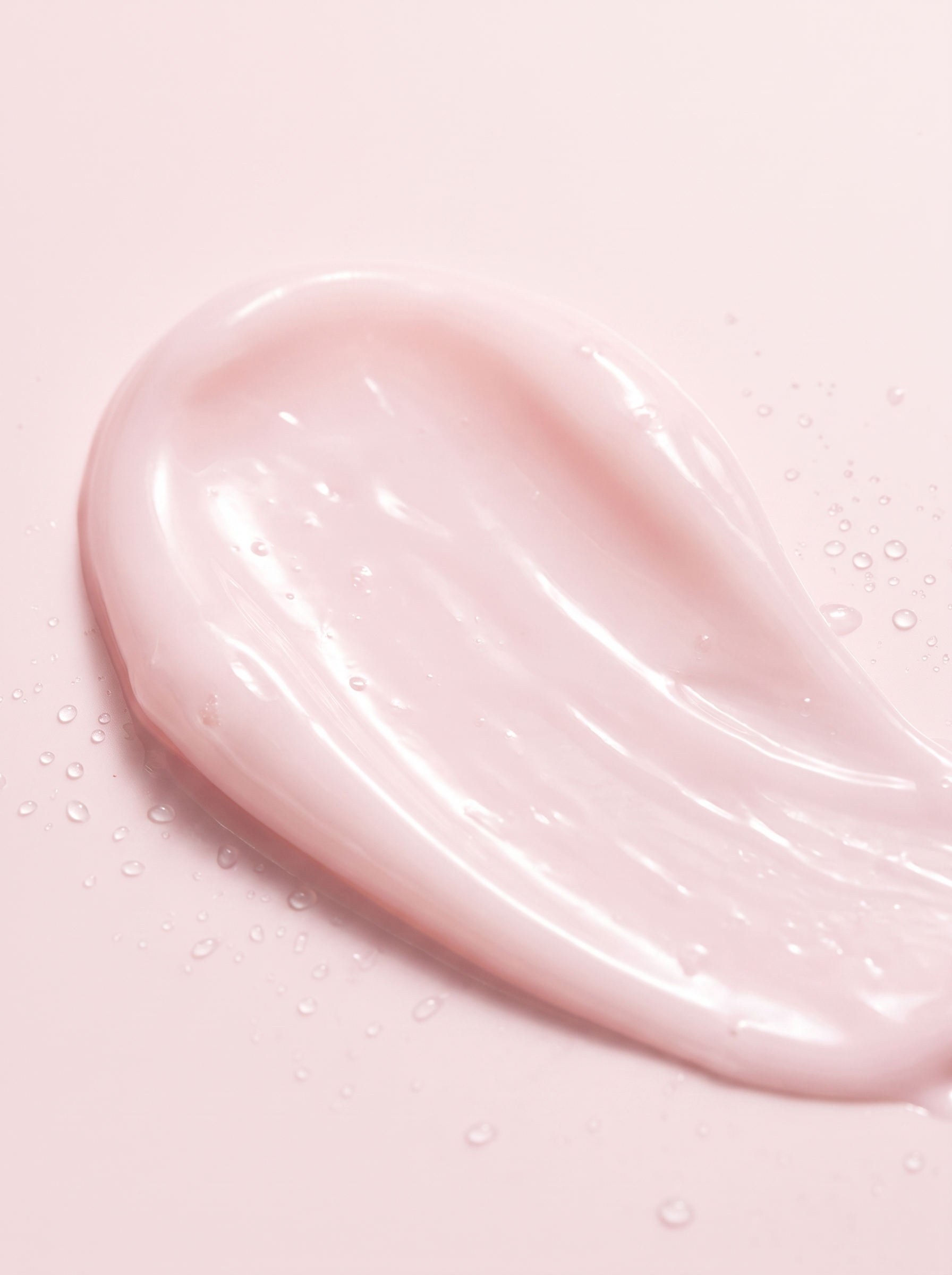 Crema Hidratante PDRN Pink KOEC — macro del swatch de crema watery rosa